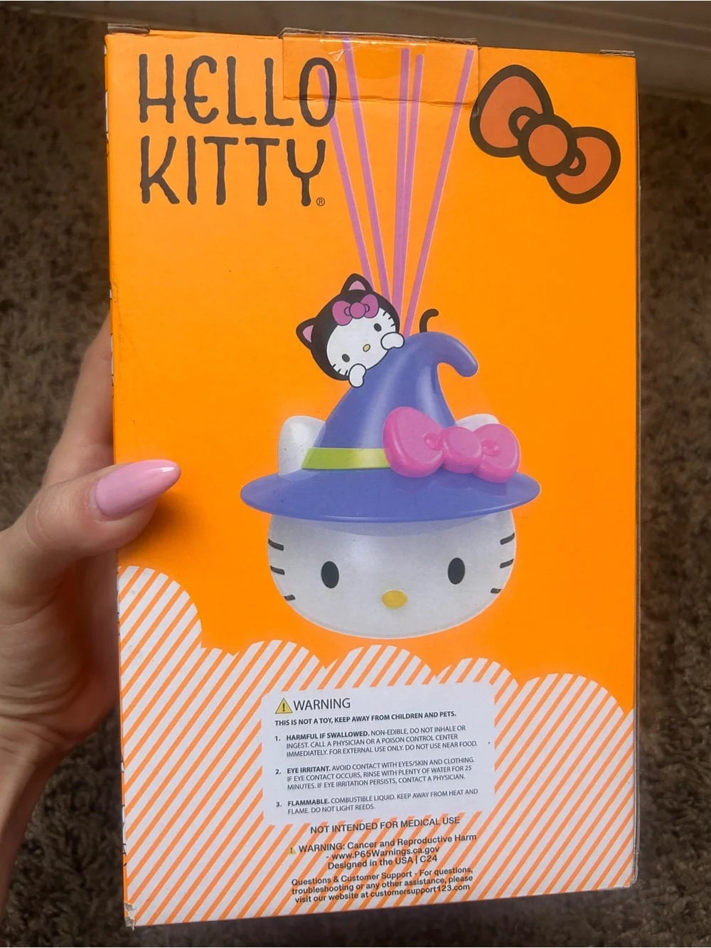 Hello Kitty Ceramic Reed Diffuser — Orange Box with Purple Hat & Pink Bow
